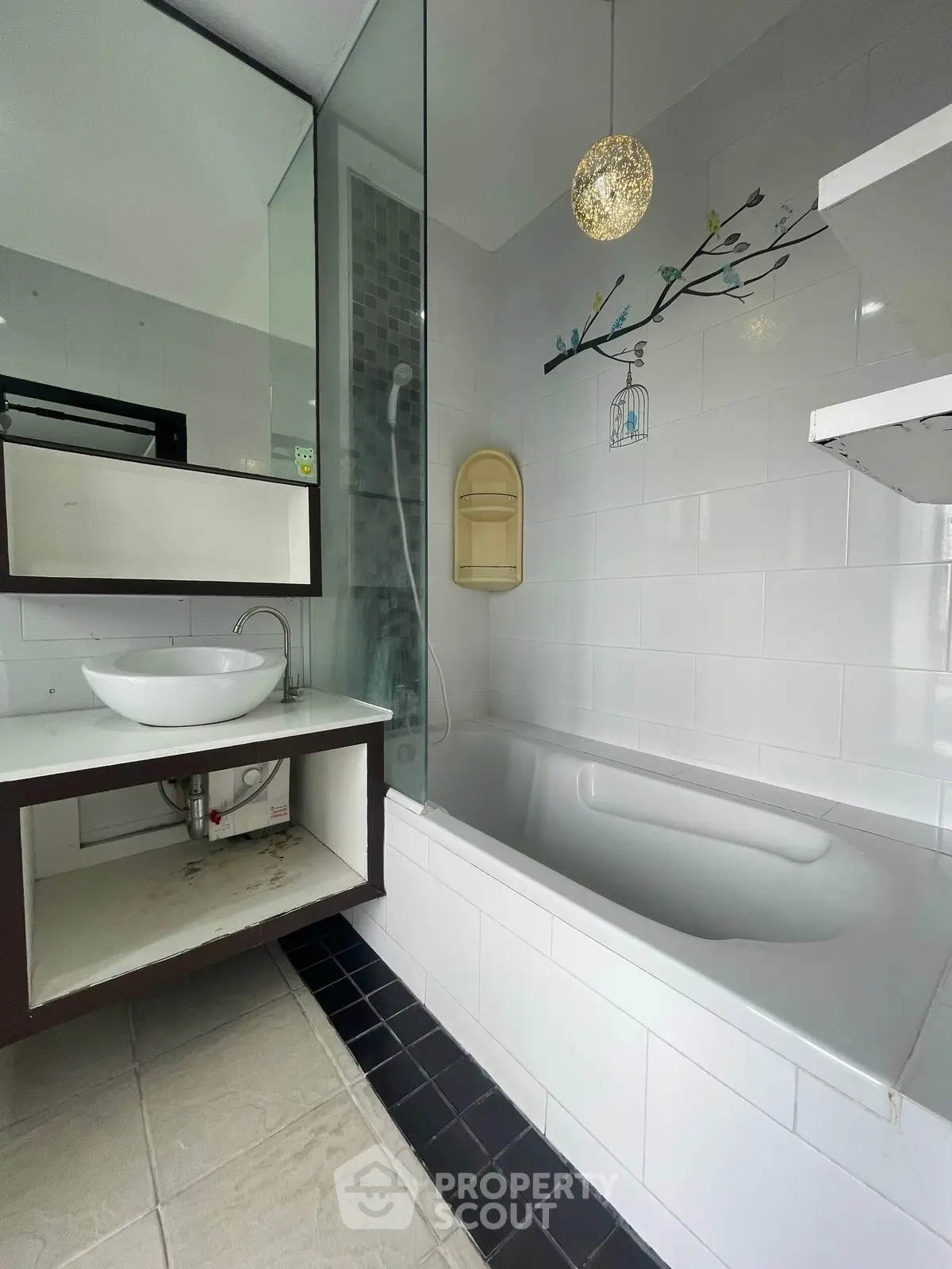 Modern bathroom with bathtub and stylish fixtures in a contemporary home.