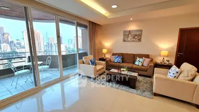 Spacious living room with balcony and city view in modern apartment