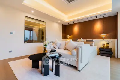 Luxurious modern living room with elegant lighting and stylish decor