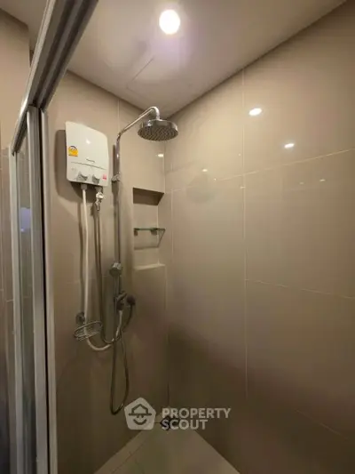 Modern bathroom shower with sleek design and overhead rain showerhead
