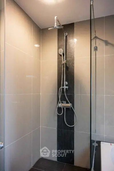 Modern bathroom with sleek shower design and elegant tile work
