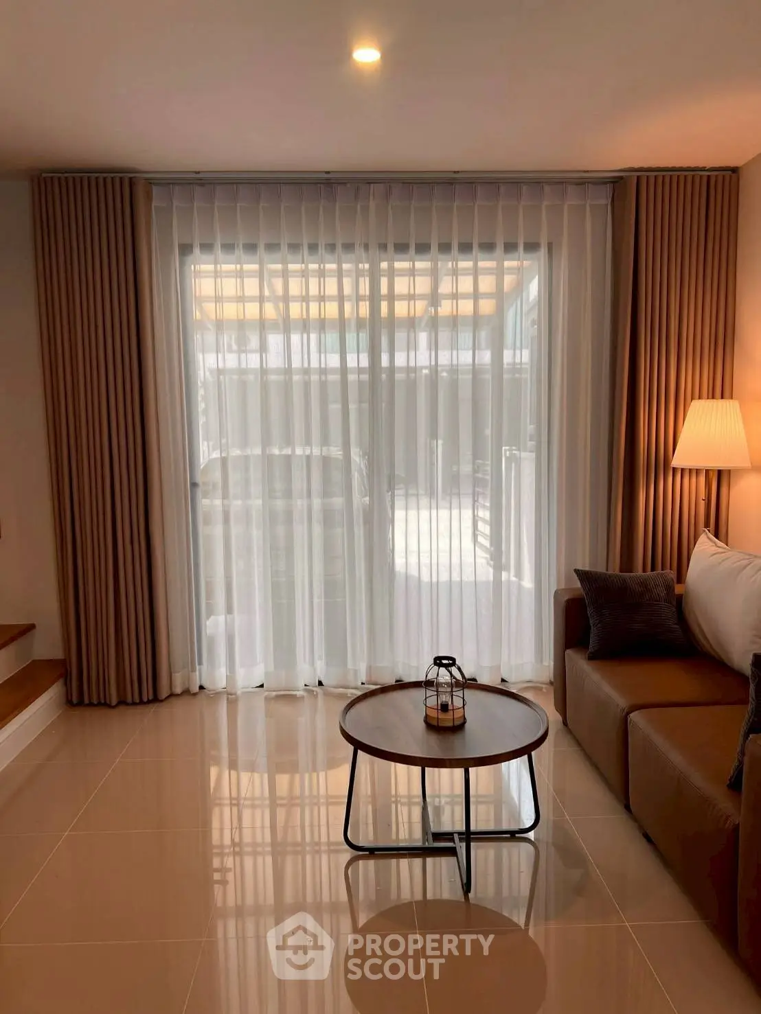 Cozy living room with modern decor and natural light