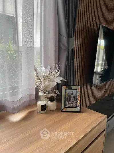 Stylish modern living room with wooden accents and elegant decor