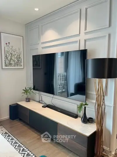 Modern living room with sleek TV setup and elegant decor