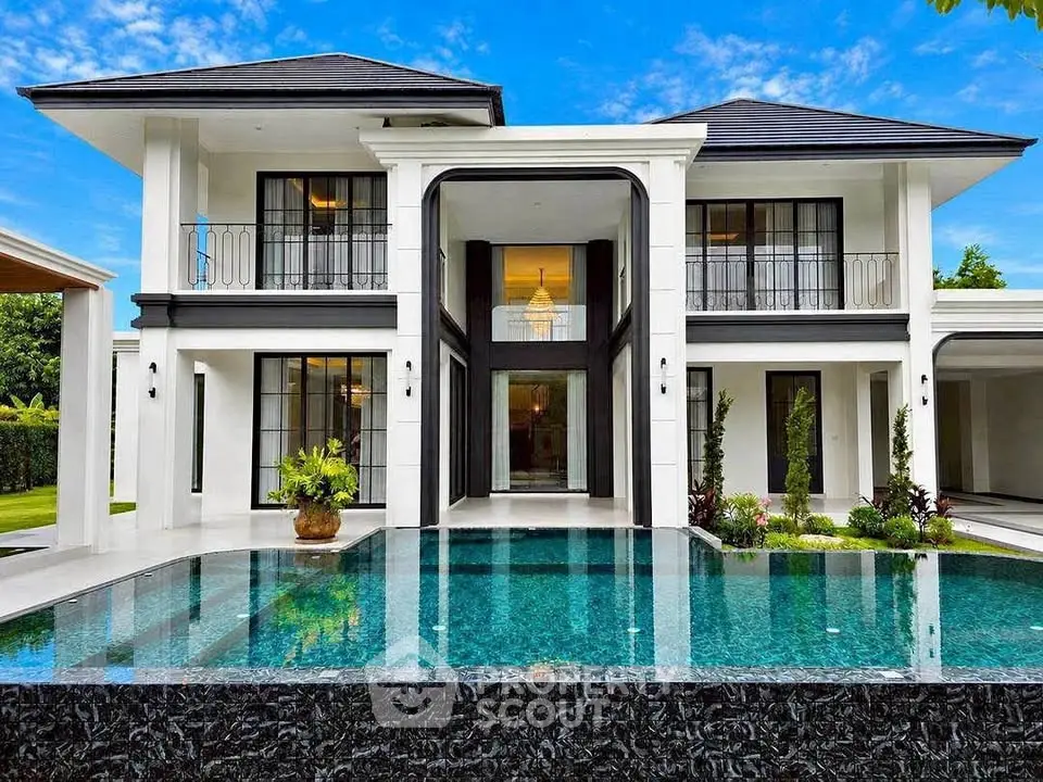 Luxurious modern villa with stunning pool and elegant architecture