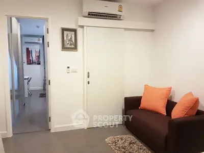 Cozy living room with modern decor and air conditioning