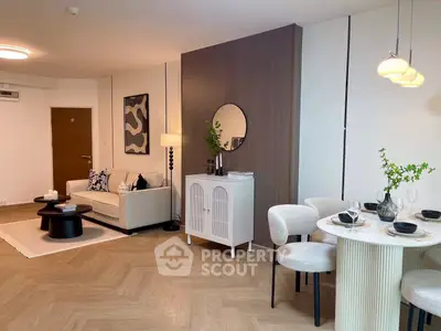Modern living room with stylish decor and dining area, featuring elegant furniture and warm lighting.