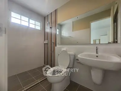 Modern bathroom with sleek design and spacious shower area