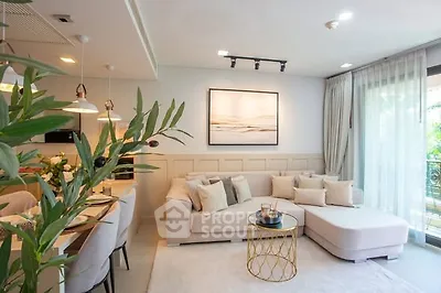Stylish living room with modern decor and large windows for natural light.
