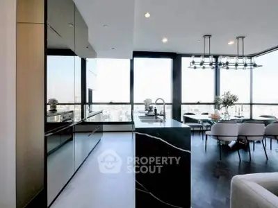 Luxurious modern kitchen with open layout and stunning city view, featuring sleek cabinetry and elegant dining area.