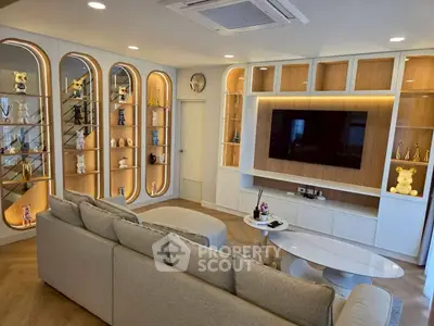 Luxurious living room with elegant built-in shelves and modern decor