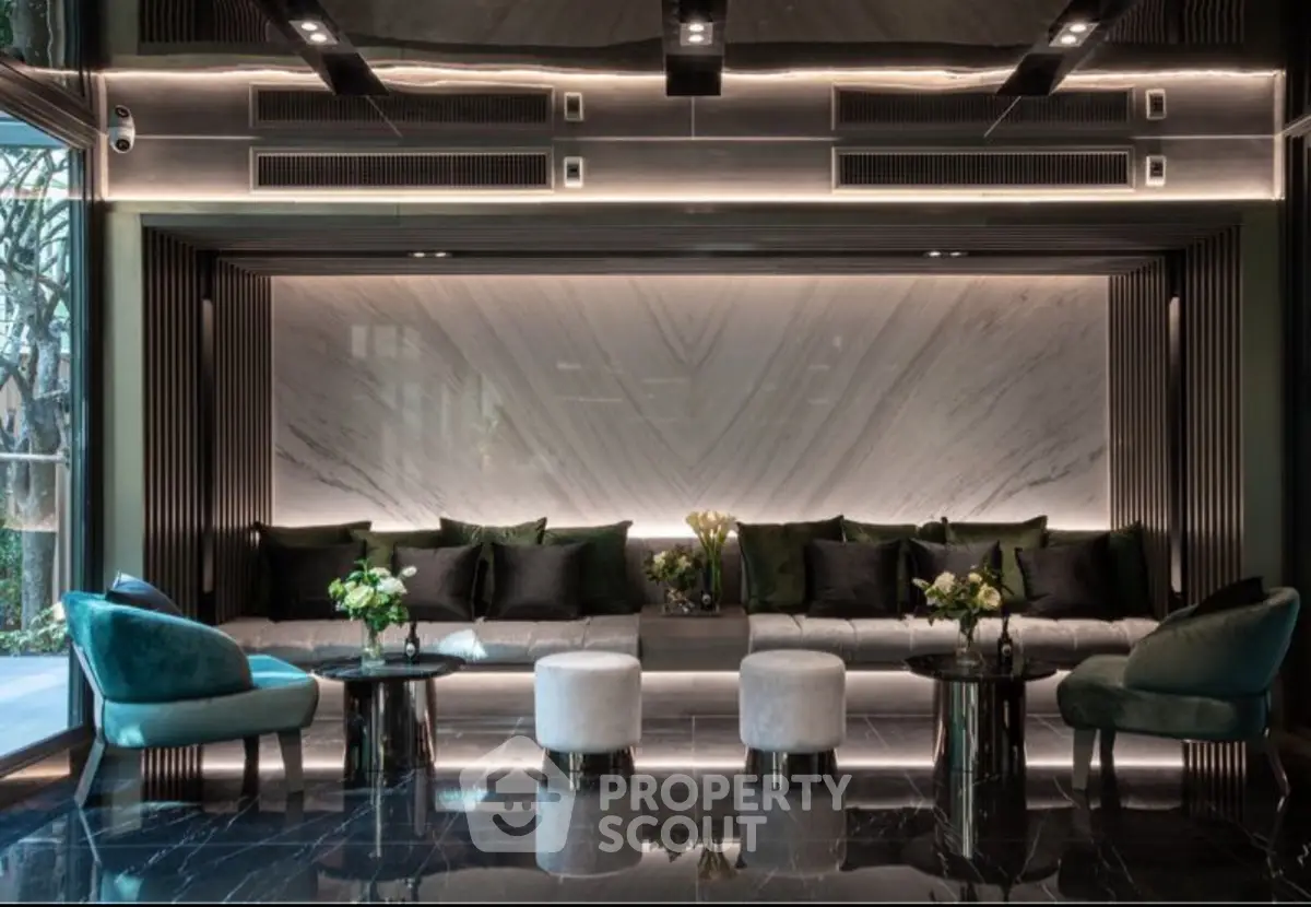 Luxurious modern lobby with elegant seating and marble accents