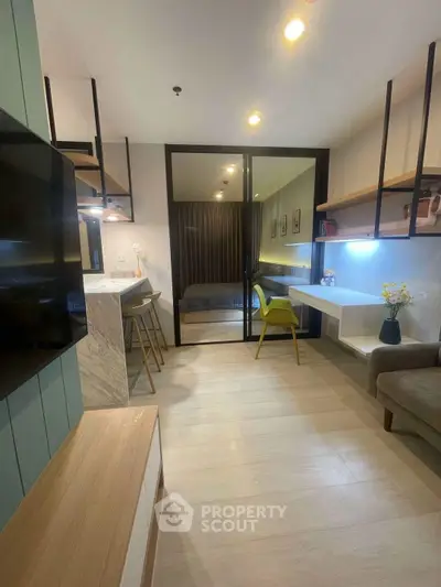 Modern open-plan living space with stylish decor and cozy ambiance