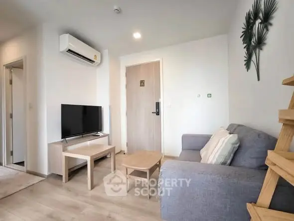 Modern living room with air conditioning and stylish decor in a cozy apartment.