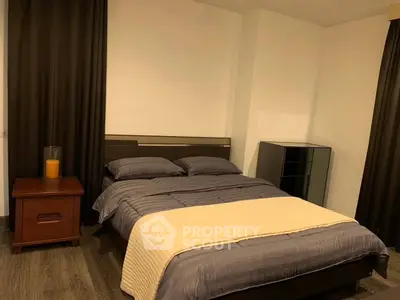 Cozy bedroom with modern decor and stylish furnishings, perfect for relaxation and comfort.