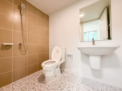 Modern bathroom with sleek fixtures and elegant tile design