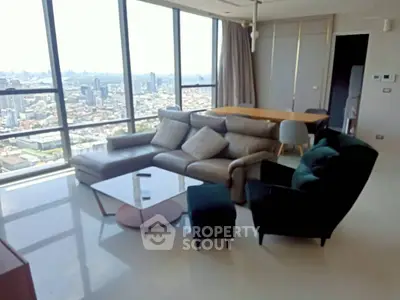 Luxurious living room with stunning city view and modern furniture