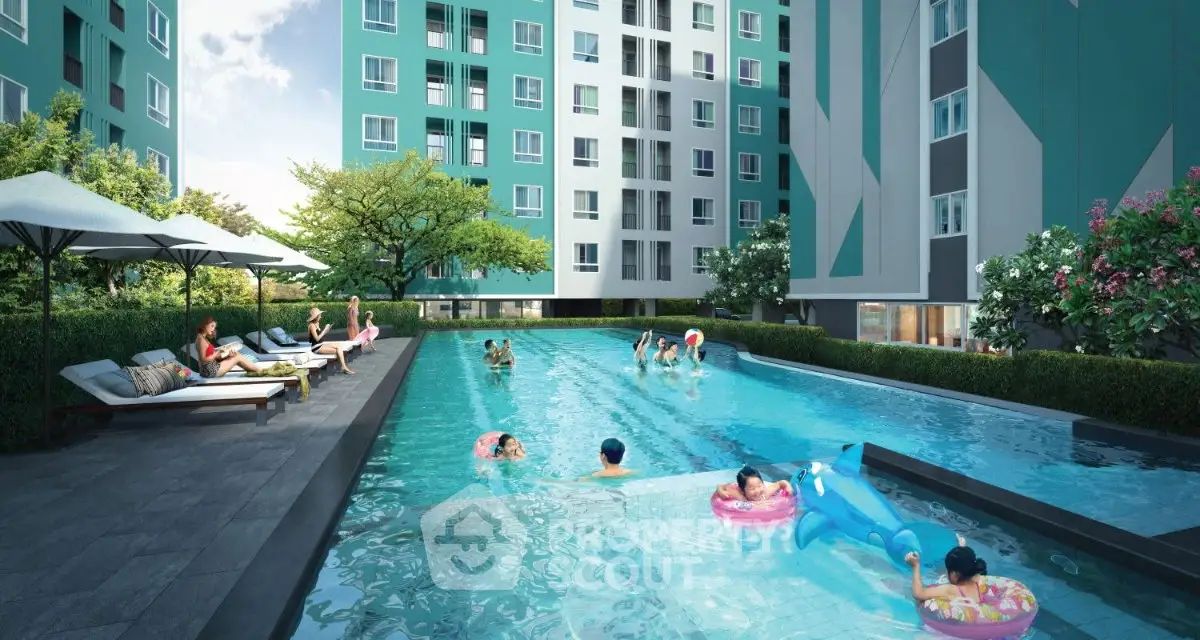Modern apartment complex with outdoor pool and lounging area