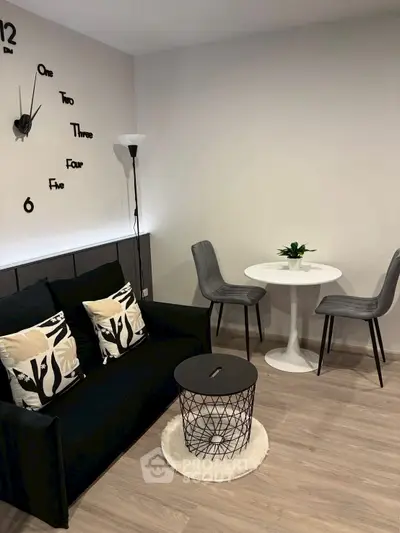 Modern living room with stylish decor and cozy seating area