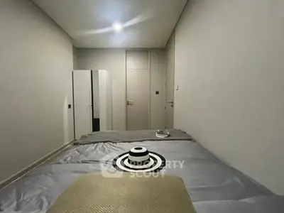 Modern minimalist bedroom with sleek design and neutral tones