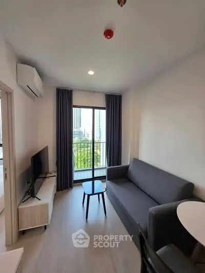 Modern living room with balcony view in a stylish apartment