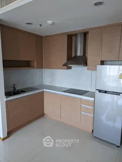 Modern kitchen with sleek cabinetry and stainless steel appliances