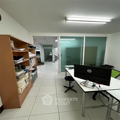 Modern office space with sleek design and ample storage, perfect for productivity and organization.