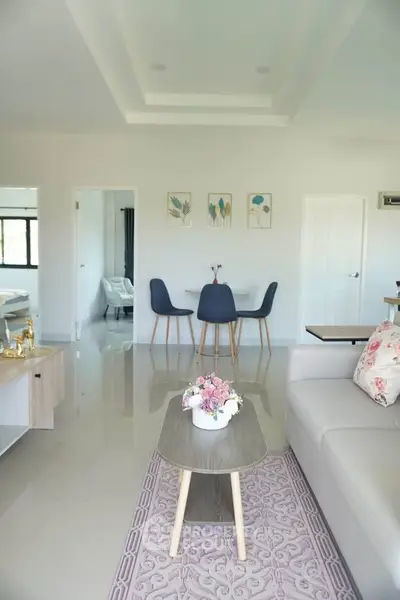 Modern living room with elegant decor and dining area