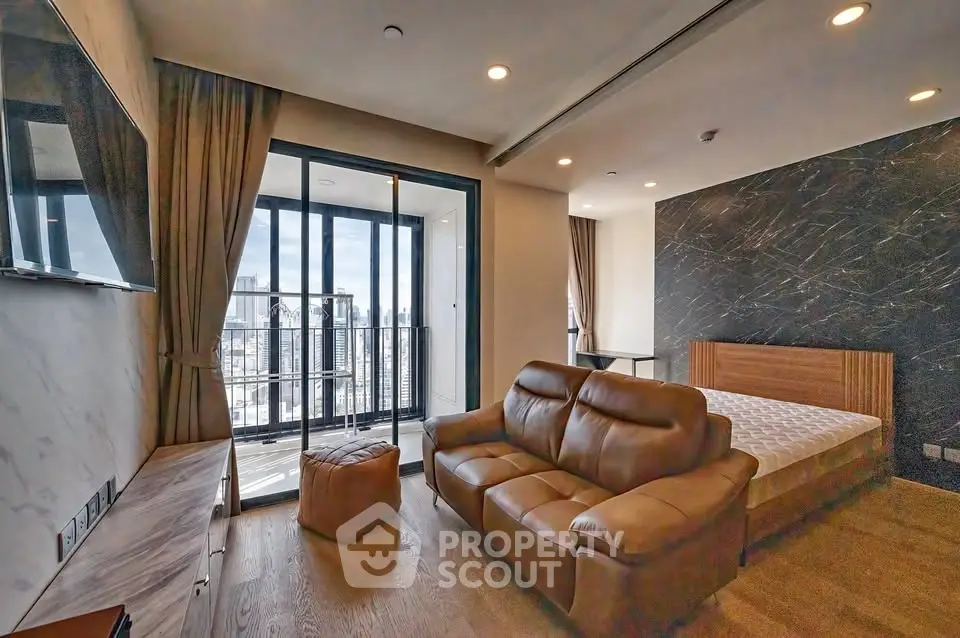 Modern living room with leather sofa and city view balcony in luxury apartment