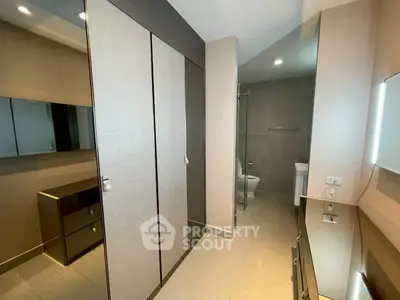 Modern bathroom with sleek design and ample storage space