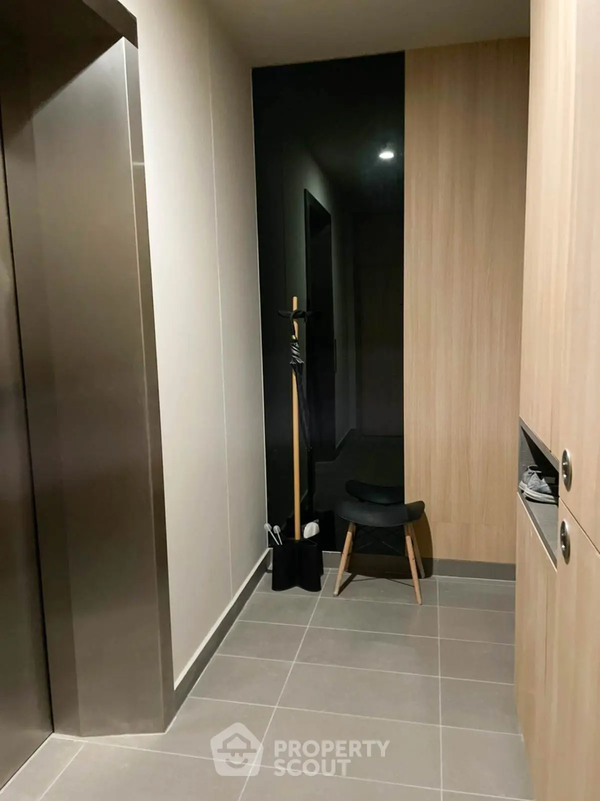 Modern elevator lobby with sleek design and minimalist decor