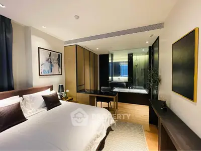 Luxurious modern bedroom with ensuite bathroom and elegant decor