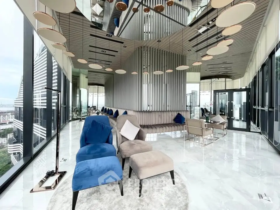 Luxurious modern living room with panoramic city views and elegant furnishings.