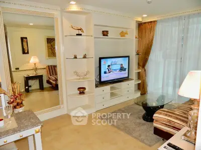 Luxurious living room with elegant decor and modern entertainment center