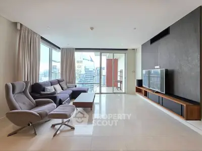 Spacious modern living room with city view and sleek furniture