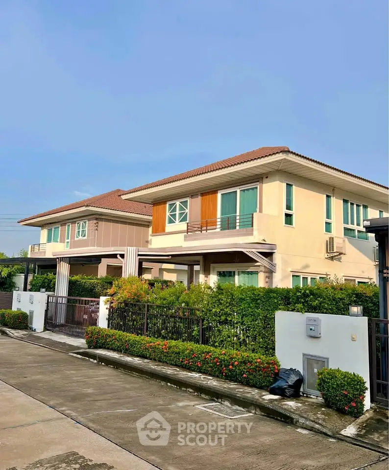 Charming suburban houses with lush greenery and modern design in a peaceful neighborhood.