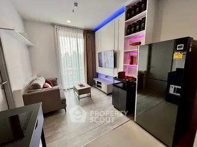 Modern living room with sleek design, featuring a cozy sofa, large TV, and stylish lighting for a contemporary feel.