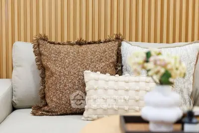 Stylish modern living room with textured cushions and elegant decor