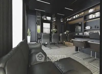 Luxurious modern living room with sleek black furniture and built-in bookshelves.
