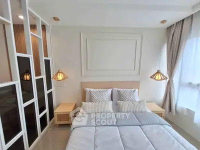 Modern bedroom with stylish decor and natural light