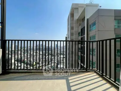 Spacious balcony with stunning city view in modern high-rise building