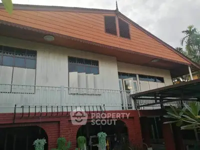 Charming traditional house with unique architectural design and spacious balcony, perfect for serene living.