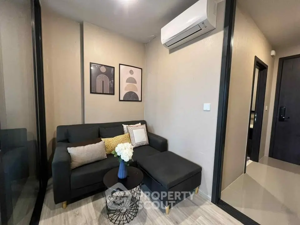 Cozy living room with modern decor and air conditioning