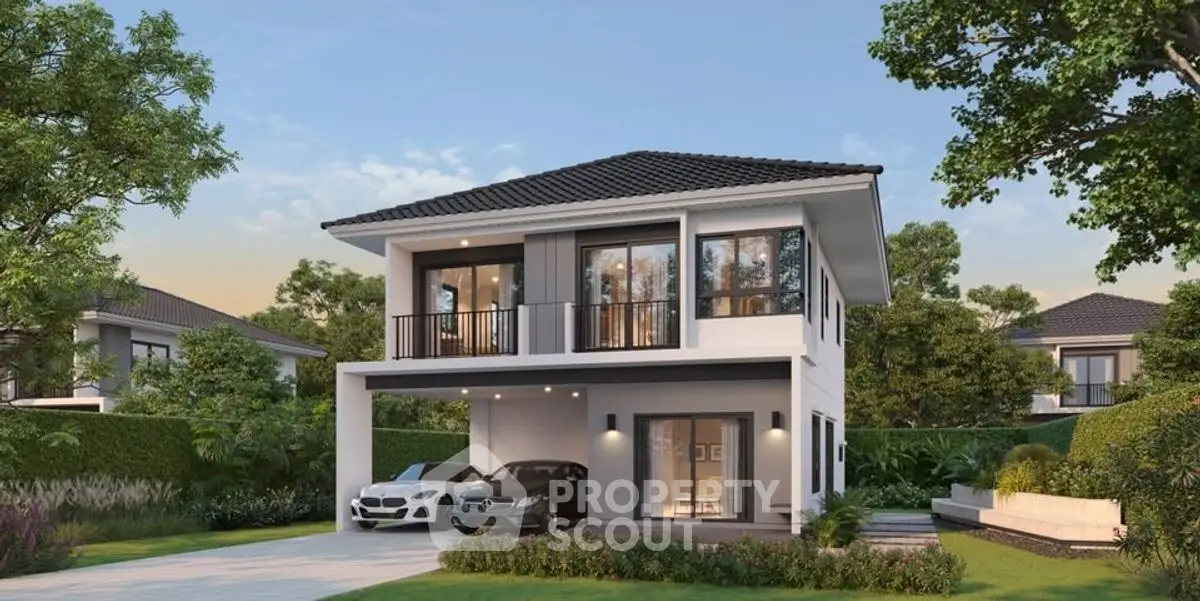 Modern two-story house with driveway and lush garden