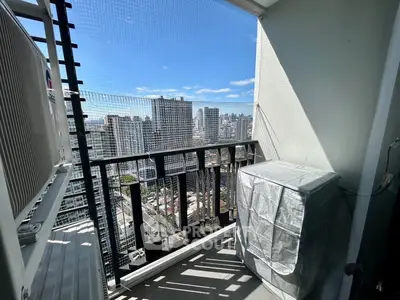 Charming balcony with city skyline view, perfect for relaxation and enjoying urban living.