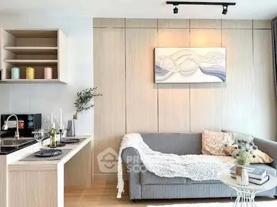 Modern living room with stylish decor and cozy sofa in a bright apartment.