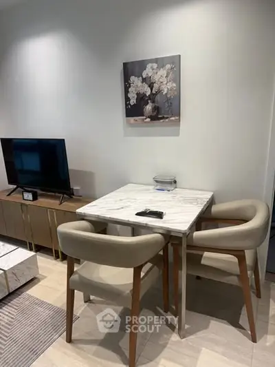 Modern living room with stylish dining area and elegant decor