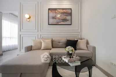 Elegant living room with modern decor and cozy sectional sofa