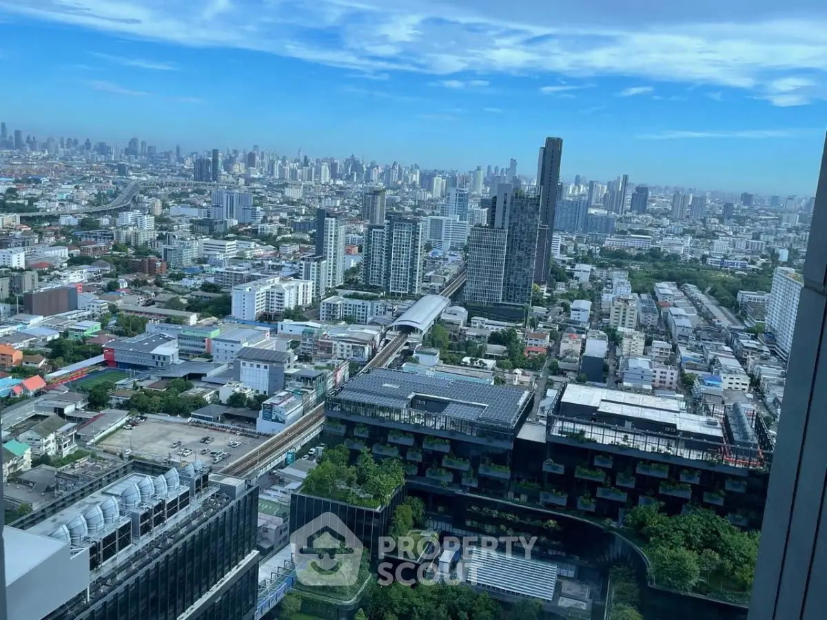 Stunning cityscape view from high-rise building showcasing urban skyline and architecture.