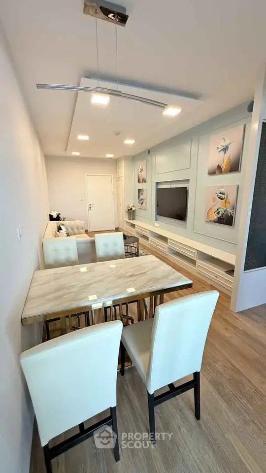 Modern living room with elegant dining area and stylish decor